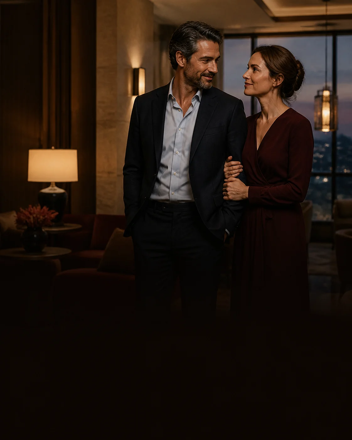 Mature couple sharing a warm moment in an elegant private lounge